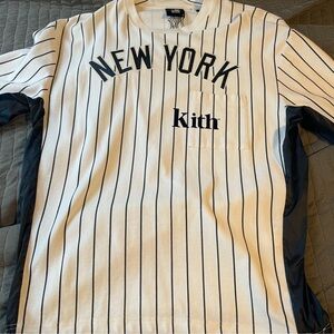 Kith White Baseball Jersey with New York Text and Vertical Stripes